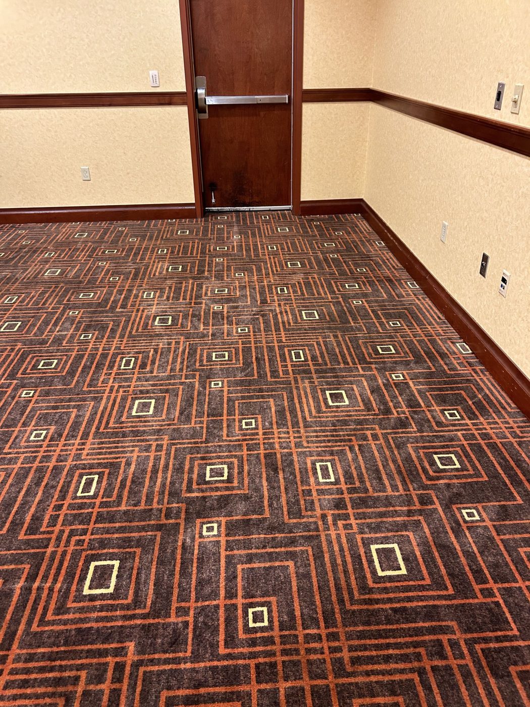 The same commercial carpet with bright colors after cleaning